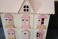 Drewniany domek do zabawy elc
